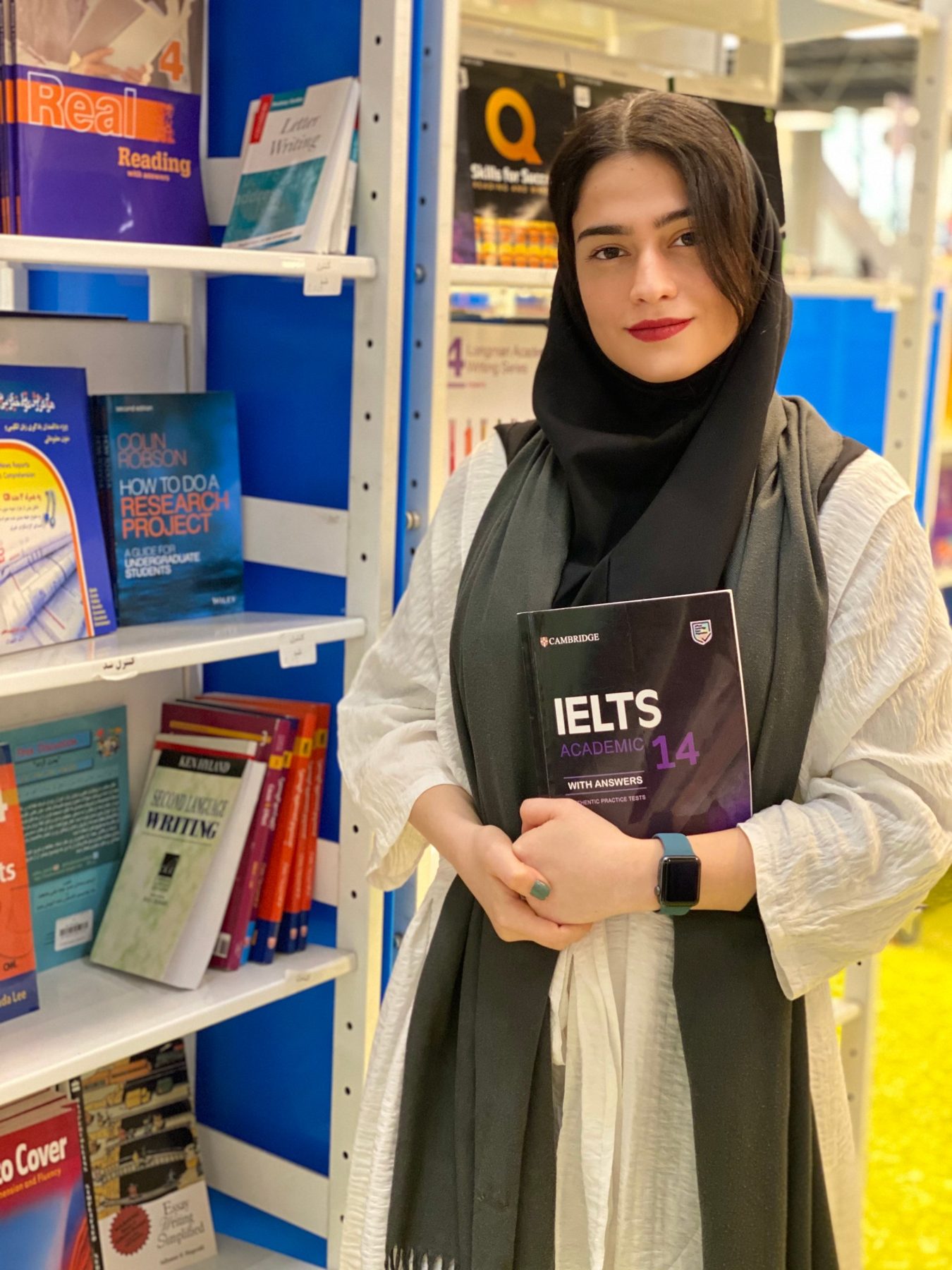 An Apex student with her IELTS Academic book