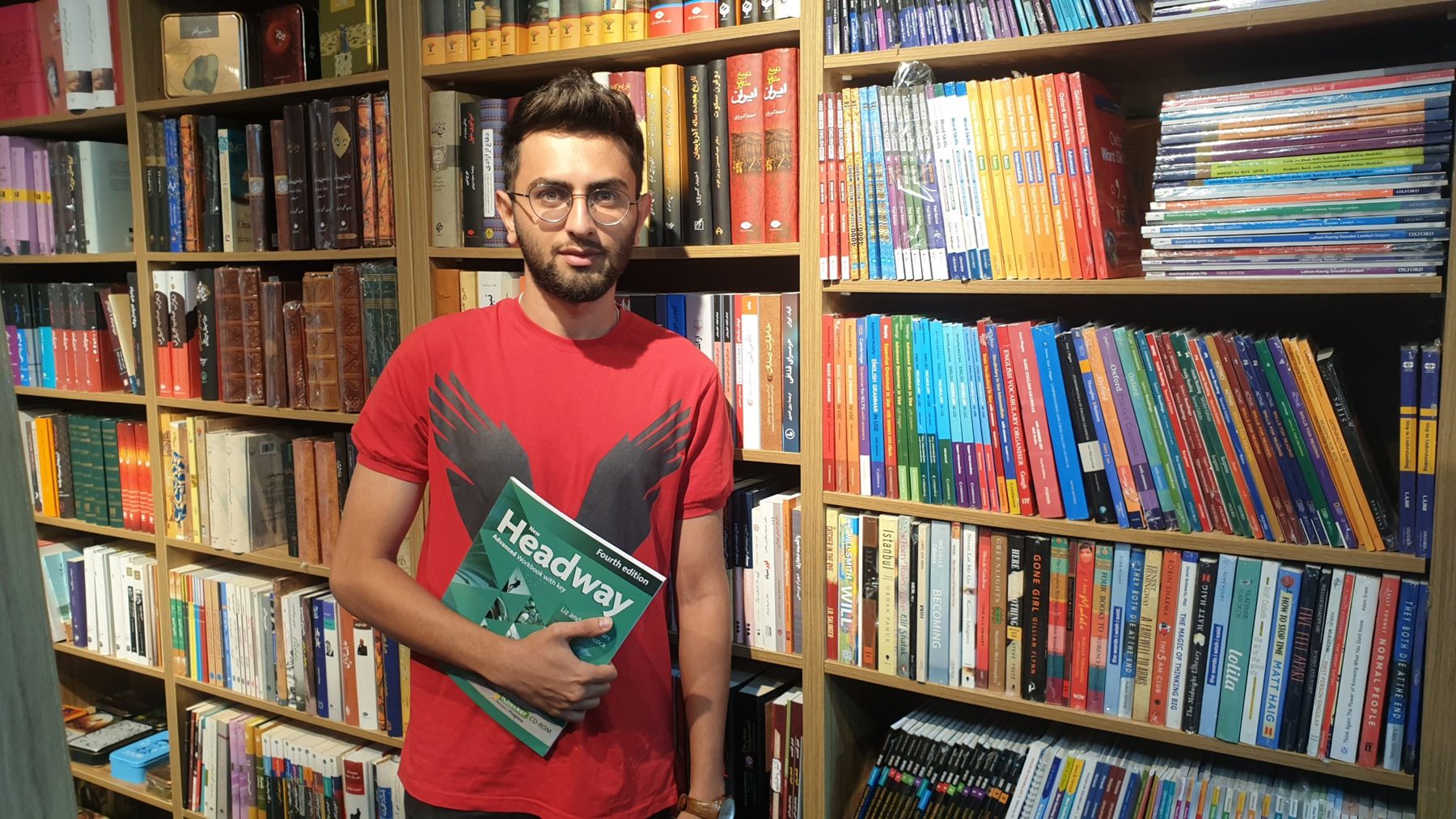 An Apex student with his Headway workbook
